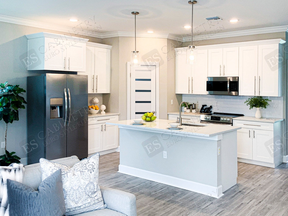 white shaker kitchen cabinets | artificial lighting